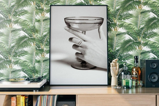 Woman Holding a Glass of Champagne Poster